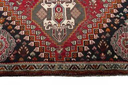 Central medallion detail of 2000s Shiraz rug from Iran / Persia