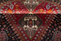Full view of 2000s Shiraz rug from Iran / Persia, 164 × 120 cm in Red tones