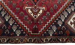 Central medallion detail of 2000s Shiraz rug from Iran / Persia