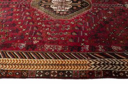 Full view of 2000s Shiraz rug from Iran / Persia, 276 × 165 cm in Red tones