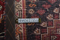 Close-up detail of 2000s Shiraz rug from Iran / Persia showing Wool weave