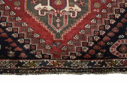 Central medallion detail of 2000s Shiraz rug from Iran / Persia