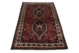 Surface texture of 2000s Shiraz rug with natural Wool and intricate pattern