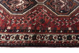 Close-up detail of 2000s Shiraz rug from Iran / Persia showing Wool weave