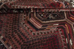 Full view of 2000s Shiraz rug from Iran / Persia, 275 × 207 cm in Red tones