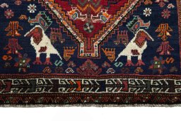 Central medallion detail of 2000s Shiraz rug from Iran / Persia