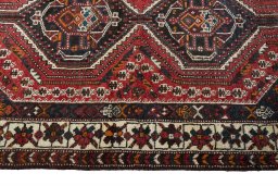 Close-up detail of 2000s Shiraz rug from Iran / Persia showing Wool weave