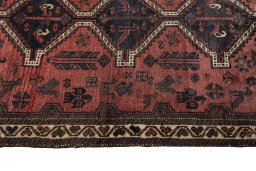 Close-up detail of 2000s Shiraz rug from Iran / Persia showing Wool weave