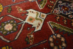 Close-up detail of 2000s Shiraz rug from Iran / Persia showing Wool weave