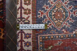 Central medallion detail of 2000s Shiraz rug from Iran / Persia