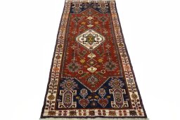 Surface texture of 2000s Shiraz rug with natural Wool and intricate pattern