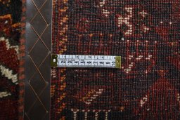 Corner detail of 2000s Shiraz rug showing border pattern and Wool pile