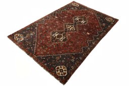 Corner detail of 2000s Shiraz rug showing border pattern and Wool pile