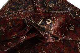 Full view of 2000s Shiraz rug from Iran / Persia, 265 × 177 cm in Red tones