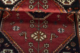 Full view of 2000s Shiraz rug from Iran / Persia, 156 × 110 cm in Red tones