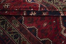 Full view of 2000s Shiraz rug from Iran / Persia, 260 × 172 cm in Red tones