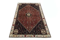 Surface texture of 2000s Shiraz rug with natural Wool and intricate pattern