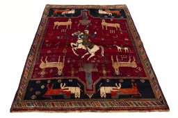 Surface texture of 2000s Shiraz rug with natural Wool and intricate pattern