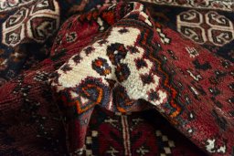 Close-up detail of 2000s Shiraz rug from Iran / Persia showing Wool weave
