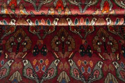 Full view of 2000s Shiraz rug from Iran / Persia, 300 × 160 cm in Red tones