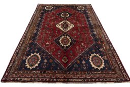 Surface texture of 2000s Shiraz rug with natural Wool and intricate pattern