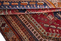 Close-up detail of 2000s Shiraz rug from Iran / Persia showing Wool weave