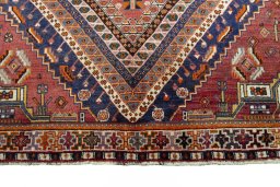 Full view of 2000s Shiraz rug from Iran / Persia, 264 × 152 cm in Red tones