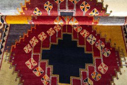Full view of 2000s Shiraz rug from Iran / Persia, 216 × 125 cm in Red tones