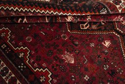 Full view of 2000s Shiraz rug from Iran / Persia, 271 × 180 cm in Red tones
