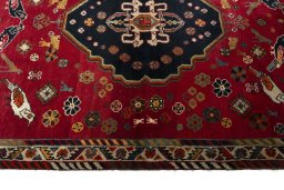 Full view of 2000s Shiraz rug from Iran / Persia, 185 × 125 cm in Red tones