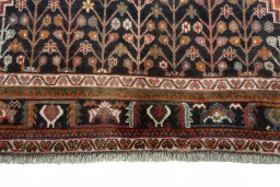 Full view of 2000s Shiraz rug from Iran / Persia, 317 × 212 cm in Red tones