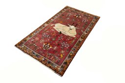 Corner detail of 2000s Shiraz rug showing border pattern and Wool pile
