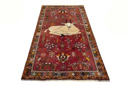 Surface texture of 2000s Shiraz rug with natural Wool and intricate pattern