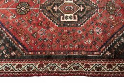 Close-up detail of 2000s Shiraz rug from Iran / Persia showing Wool weave
