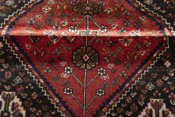 Full view of 2000s Shiraz rug from Iran / Persia, 159 × 114 cm in Red tones
