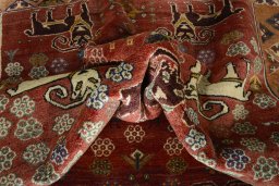 Corner detail of 2000s Shiraz rug showing border pattern and Wool pile