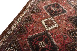 Backside of handmade 2000s Shiraz rug showing knot structure and weave density