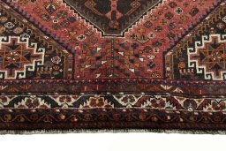 Central medallion detail of 2000s Shiraz rug from Iran / Persia