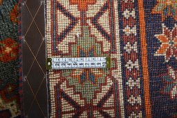 Close-up detail of 2000s Shiraz rug from Iran / Persia showing Wool weave