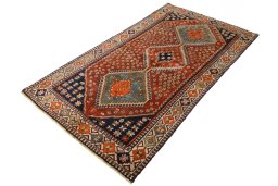 Corner detail of 2000s Shiraz rug showing border pattern and Wool pile