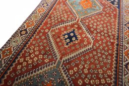 Backside of handmade 2000s Shiraz rug showing knot structure and weave density