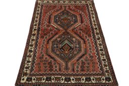 Surface texture of 2000s Shiraz rug with natural Wool and intricate pattern