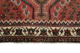 Central medallion detail of 2000s Shiraz rug from Iran / Persia