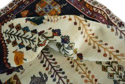 Corner detail of 2000s Shiraz rug showing border pattern and Wool pile