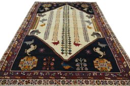 Surface texture of 2000s Shiraz rug with natural Wool and intricate pattern