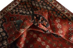 Corner detail of 1970s Shiraz rug showing border pattern and Wool pile