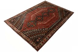 Corner detail of 1970s Shiraz rug showing border pattern and Wool pile