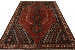 Surface texture of 1970s Shiraz rug with natural Wool and intricate pattern