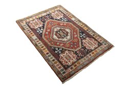 Close-up detail of 2000s Shiraz rug from Iran / Persia showing Cotton weave