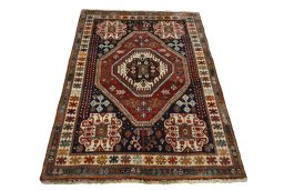Surface texture of 2000s Shiraz rug with natural Cotton and intricate pattern